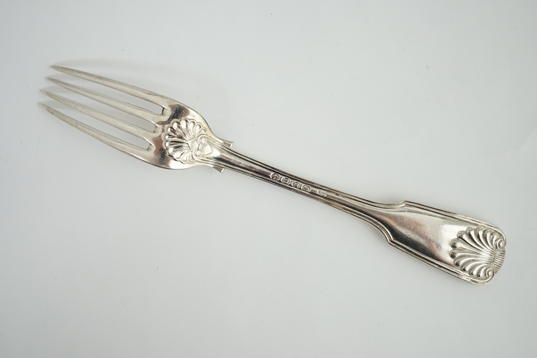 A set of six Victorian silver fiddle, thread and shell pattern table forks, by Henry John Lias and James Wakely